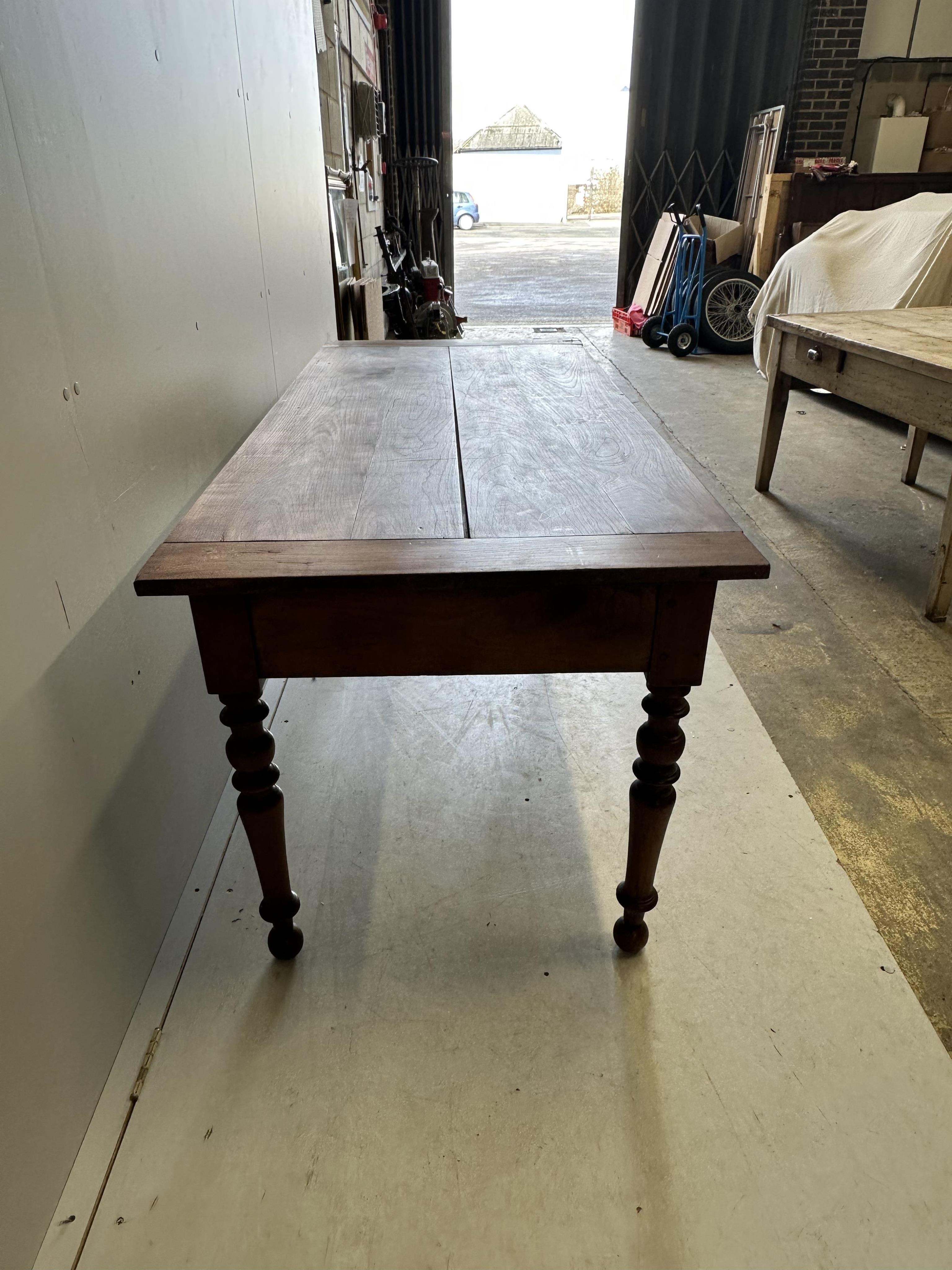 A 19th century French rectangular cherry farmhouse table, width 167cm, depth 73cm, height 73cm. Condition - fair